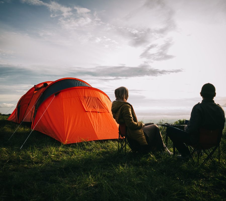 asian-couple-camping-with-sunrise-view-in-mountain.jpg